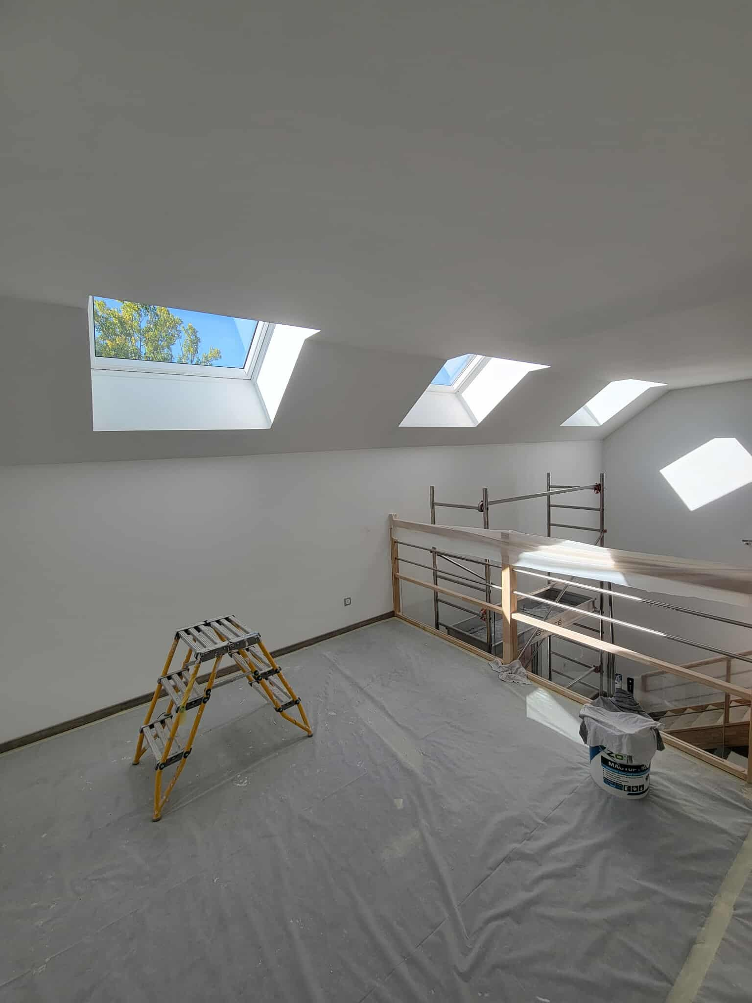 Équipe de peintres professionnels en action